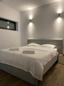 Postel nebo postele na pokoji v ubytování MODERN House