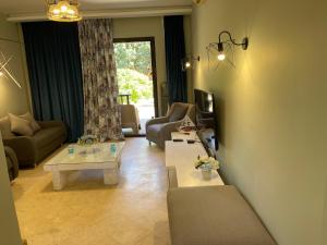 A television and/or entertainment centre at El gouna South Marina Townhouse Apartment 3 bedrooms