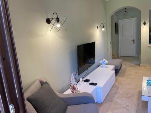 A television and/or entertainment centre at El gouna South Marina Townhouse Apartment 3 bedrooms