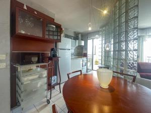 Virtuvė arba virtuvėlė apgyvendinimo įstaigoje La Dolce Vita 5 Pers Parking Terrazza