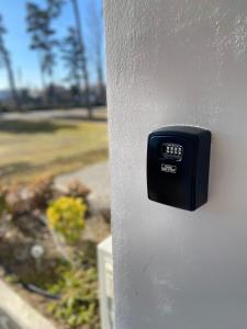 a close up of a black door knob on a house at BL LAKESIDE APARTMAN in Balatonlelle