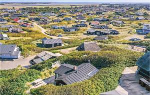 an aerial view of a suburb with houses at Holiday Home Ringkobing Xli in Søndervig +15 photos