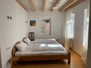 Postel nebo postele na pokoji v ubytování Haus Aurelia