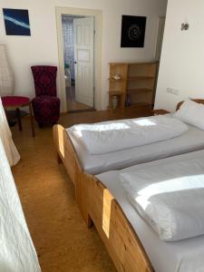Postel nebo postele na pokoji v ubytování Haus Aurelia