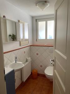 Koupelna v ubytování Haus Aurelia + 9 fotografií