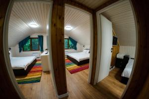 Katil atau katil-katil dalam bilik di ZADA nature lounge
