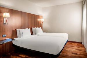 Postel nebo postele na pokoji v ubytování AC Hotel La Línea by Marriott