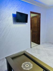 Et tv og/eller underholdning på Apartment Asilah