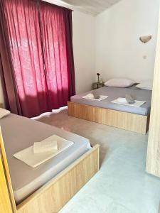 Postel nebo postele na pokoji v ubytování Apartments by the sea Podaca, Makarska - 2618