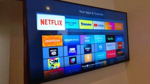 a television screen with different apps on it at El Edén 2 Bedroom with parking Space close to hospital in Parkchester