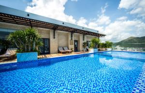 a swimming pool on the roof of a house at Putin Hotel Nha Trang in Nha Trang