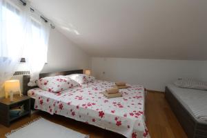 Postel nebo postele na pokoji v ubytování Apartment Lidija