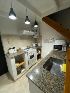 Kuhinja oz. manjša kuhinja v nastanitvi Belgrano 360
