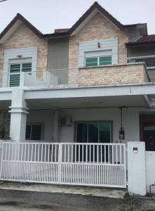 a house with a white fence in front of it at FR Comfort SEAView Kuah, Langkawi in Kuah +5 photos