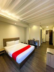 Postel nebo postele na pokoji v ubytování Airo Hotel Manila