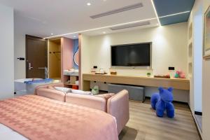 TV o dispositivi per l'intrattenimento presso Cheng Jin Hotel