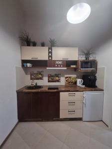 Nemuno Apartamentai tesisinde mutfak veya mini mutfak