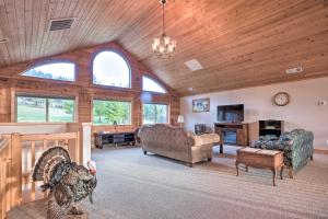 a large living room with a turkey in the center of the room at Brookings Vacation Rental Lodge on 88 Acres! in Brookings