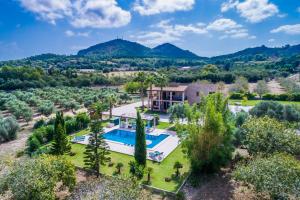 an aerial view of a villa with a swimming pool at Ideal Property Mallorca - Ca na Siona 6 PAX in Alcudia