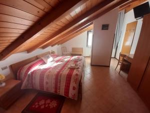 Ένα ή περισσότερα κρεβάτια σε δωμάτιο στο B&B Piazzi di Katia
