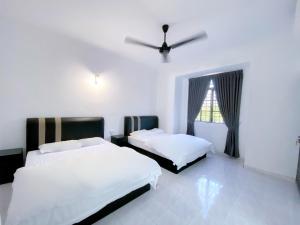 Venice Guest Hostel - Bilik Sahaja客房内的一张或多张床位