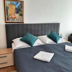 Postel nebo postele na pokoji v ubytování garni Hotel S.O.G.* * *