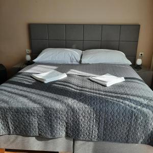 Postel nebo postele na pokoji v ubytování garni Hotel S.O.G.* * *