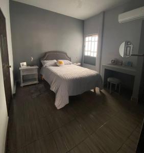 Кровать или кровати в номере Casa “La Santa”