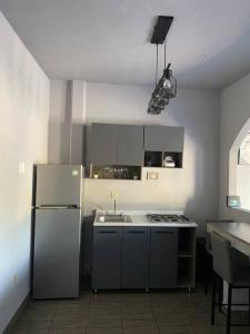Кухня или мини-кухня в Casa “La Santa”
