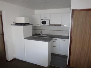 Kuchyň nebo kuchyňský kout v ubytování Chalet Gabriel + 25 fotografií