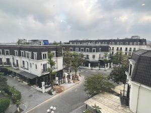 an overhead view of a city street with buildings at Moon House in Thôn Trường Giang