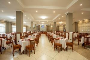 Restoran või mõni muu söögikoht majutusasutuses Haile Resort Adama