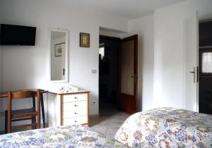 Posteľ alebo postele v izbe v ubytovaní Camere Gambacorta Assisi + 37 fotografií