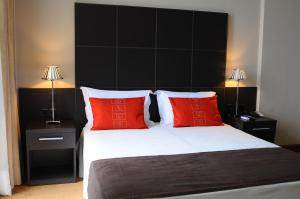 Postel nebo postele na pokoji v ubytování TANA-Boutique Hôtel