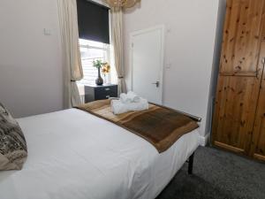 Postel nebo postele na pokoji v ubytování Sunbeach