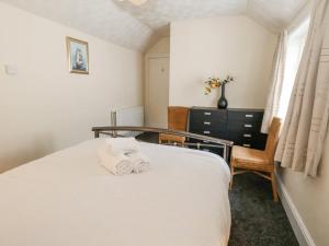 Postel nebo postele na pokoji v ubytování Sunbeach