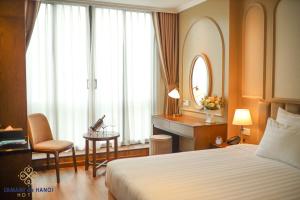 Voodi või voodid majutusasutuse L'amant de Hanoi Hotel - khách sạn Lamant de Hà Nội toas