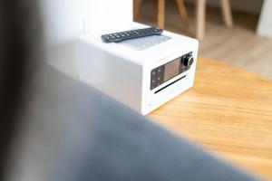 a small white appliance sitting on top of a table at Steg N 5 in Norderney +19 photos