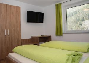 Postel nebo postele na pokoji v ubytování Landhaus Juleiko