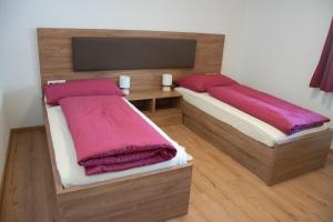 Postel nebo postele na pokoji v ubytování Landhaus Juleiko