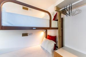 Postel nebo postele na pokoji v ubytování Olá Vida - Hostel Caminha