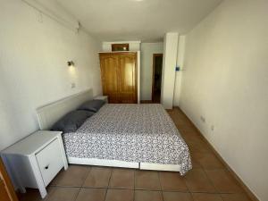 Posteľ alebo postele v izbe v ubytovaní AR27-3 primera línea de playa + 17 fotografií