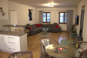 Predel za sedenje v nastanitvi Apartmany U Lva
