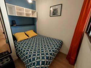 Posteľ alebo postele v izbe v ubytovaní Bel appartement au bord de l'océan