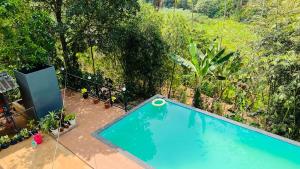 Bazen v nastanitvi oz. blizu nastanitve Golden Cypress Resort with Pool -Wayanad