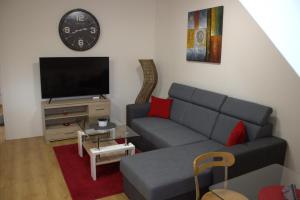 Predel za sedenje v nastanitvi Apartmany U Lva