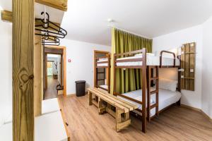 Postel nebo postele na pokoji v ubytování Olá Vida - Hostel Caminha