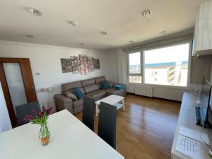 Et opholdsområde på Apartamento La Salvé - Monabri