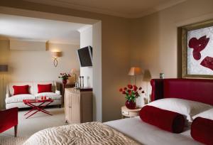 A bed or beds in a room at Grayshott Health Spa 