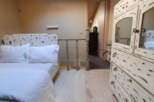 Postel nebo postele na pokoji v ubytování Fotini's home